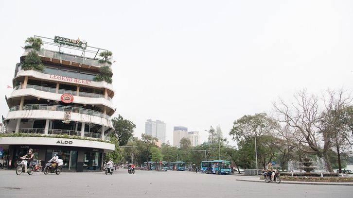 Hanoi streets left deserted after business closures
