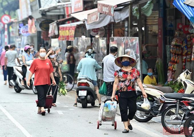 Hanoi bustles again as social distancing restrictions eased