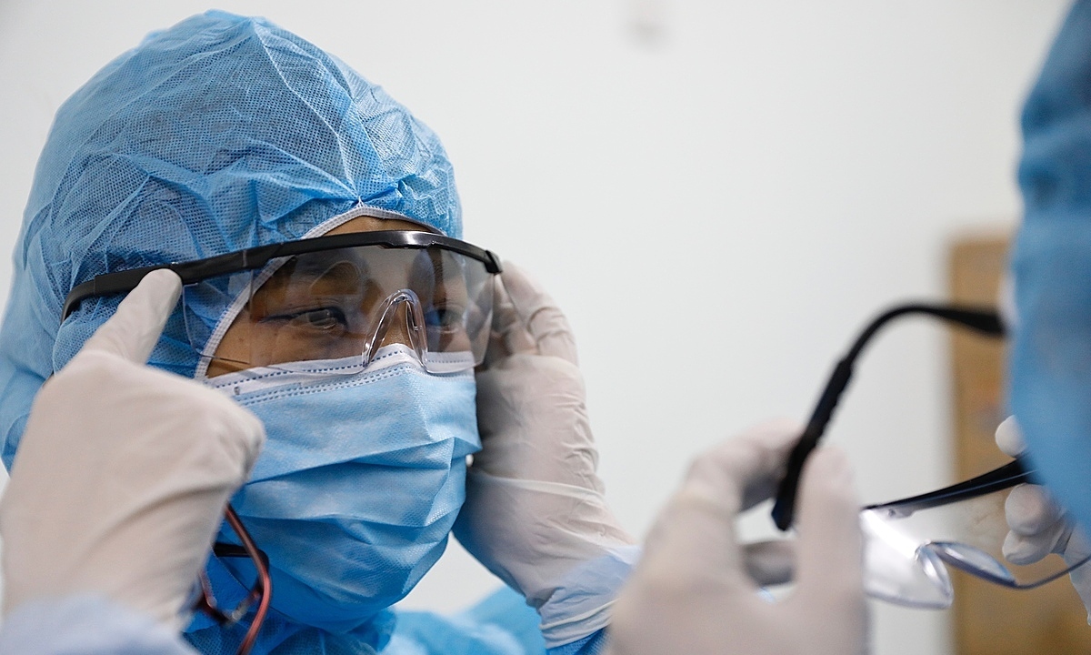 Millions of donated masks stuck in airports for months